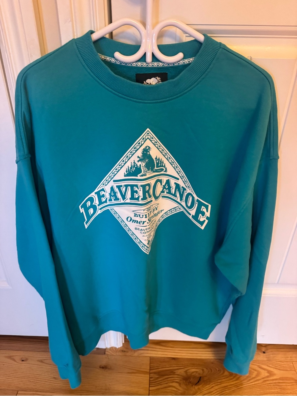 Roots Teal Crewneck Sweatshirt with Beaver Canoe Graphic